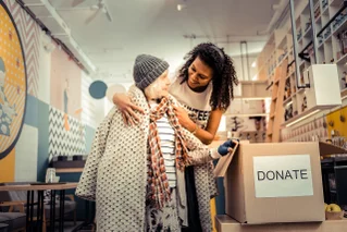 woman helping at shelter